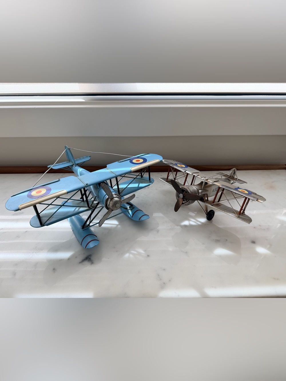 Blue Vintage-Style Biplane Toy Model